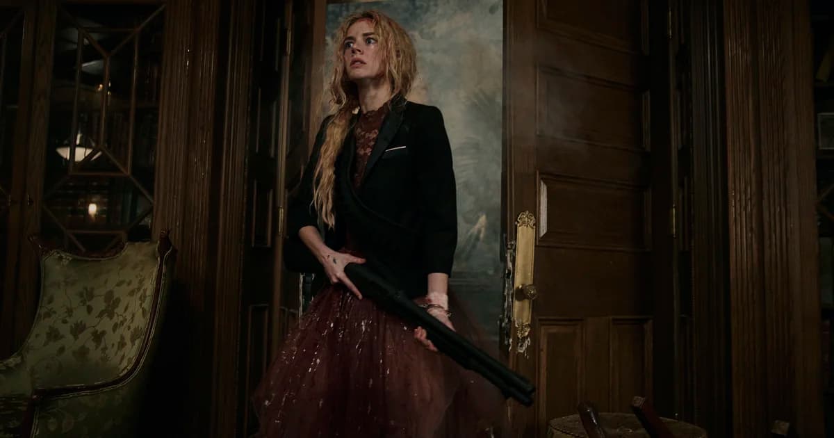 Ready or Not 2: Here I Come still: Samara Weaving holds a firearm in a dark interior