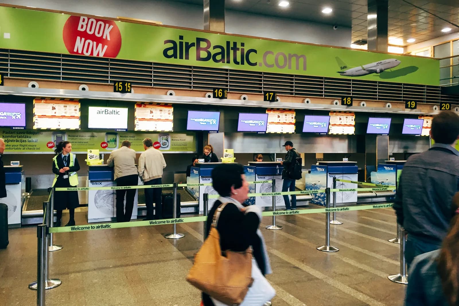 Check-in counters at Riga Airport, an example of airport check-in.
